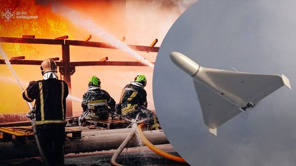 Понад дві сотні рятувальників другу добу гасять пожежу після російського удару по Київщині