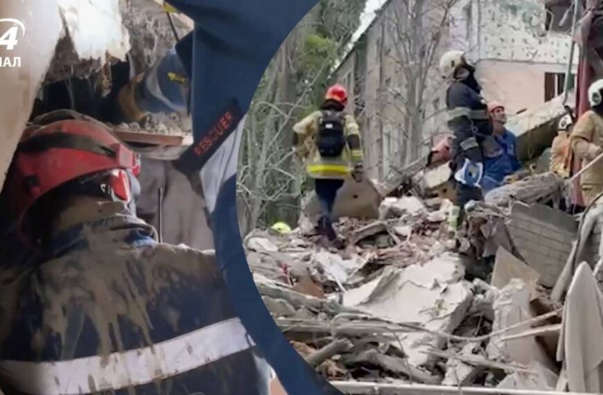 Чоловіка затиснуло на 1 поверсі зруйнованого будинку у Києві: рятувальна операція триває