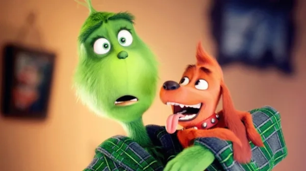 Грінч тримає свого собаку Макса та виглядає здивованим у мультфільмі доктора Сьюза «Грінч».