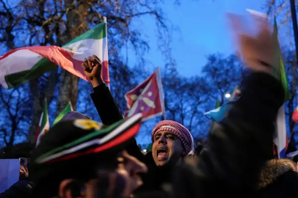Anti-Iranian regime protesters take part in a demonstration outside the Iranian Embassy in central London on January 10, 2026. (Photo by CARLOS JASSO / AFP via Getty Images)