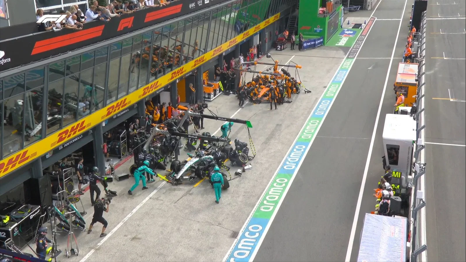 Mercedes and McLaren make pit stops on their F1 cars