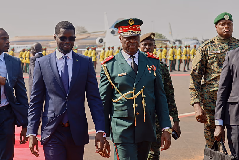 FILE - Guinea-Bissau Transitional President General Horta Inta-A-Na Man, centre, and President of Senegal Bassirou Diomaye Faye, Bissau, Guinea-Bissau, Jan. 10, 2026