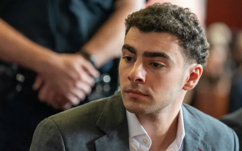 NEW YORK, NEW YORK - AUGUST 11: Luigi Mangione attends a pre-trial appearance at Manhattan Criminal Court on August 11, 2026 in New York City. Mangione is accused of fatally shooting UnitedHealthcare CEO Brian Thompson and faces state and federal murder charges. David Dee Delgado-Pool/Getty Images/AFP (Photo by POOL / GETTY IMAGES NORTH AMERICA / Getty Images via AFP)