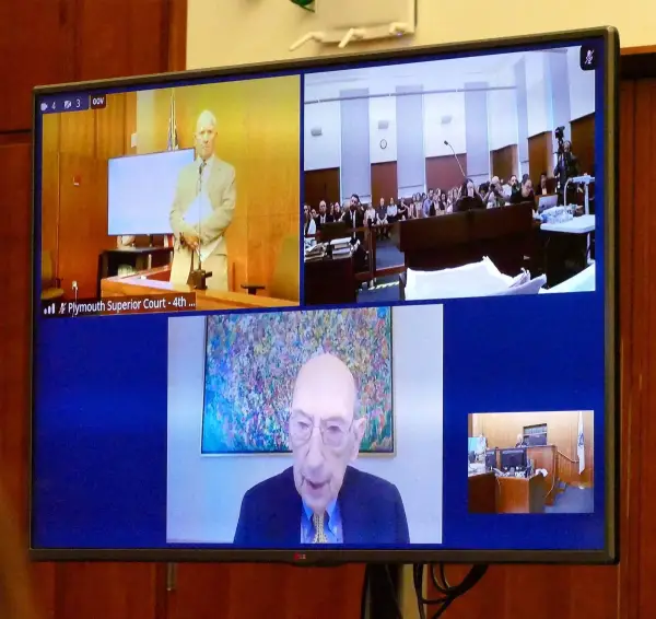 Екран показує адвоката захисту Кевіна Реддінгтона під час допиту свідка Філіпа Резніка, дистанційно, з Клівленда, штат Огайо, під час судового процесу над Ліндсі Кленсі, Плімут, США, 21 серпня 2026 року. Mark Jarret Chavous/Pool via REUTERS
