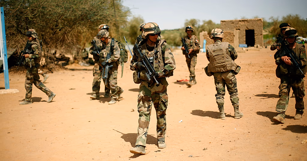 French soldiers secure the area where a suicide bomber attacked, at the entrance of Gao, northern Mali.