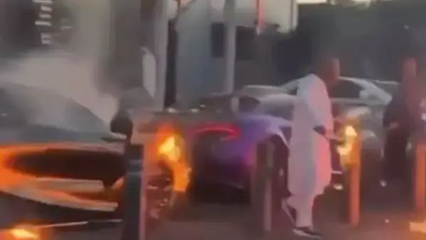 A screen grab of the Royal Shalimar on Highgate Road, Birmingham showing a car on fire.
