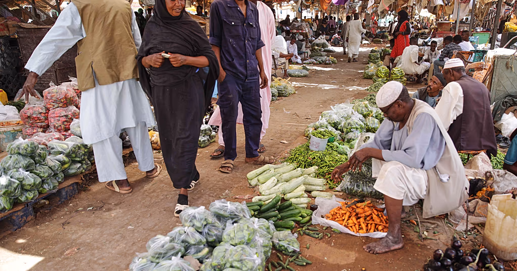 Street vendors sell vegetables at a market in Omdurman in Khartoum, Sudan, Thursday, Aug. 27, 2026.