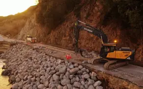 Progress on rock work on State Highway 1 at Hawkswood, next to the Conway River, on July 14, a week after the highway was closed due to bad weather.