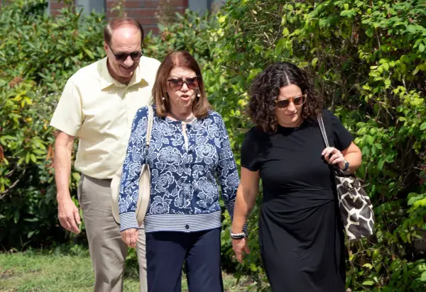 Lindsay Clancy's parents Michael Musgrove (L), Paula Musgrove (C) and Allison Ozga, sister of Lindsay Clancy, arrive for the afternoon session at the courthouse as the jury deliberation phase continues in Lindsay Clancy's murder trial at the Plymouth County Superior Court in Plymouth, Massachusetts, on September 3, 2026. The defense for Lindsay Clancy, the US mother accused of murdering her three children, on Thursday accused a single holdout juror of blocking a verdict in the high-profile trial. Judge William Sullivan will hold an inquiry on September 4 as jurors return for a seventh day of deliberations, after roughly 36 hours spent trying to reach a unanimous verdict. (Photo by Rick Friedman / AFP via Getty Images)